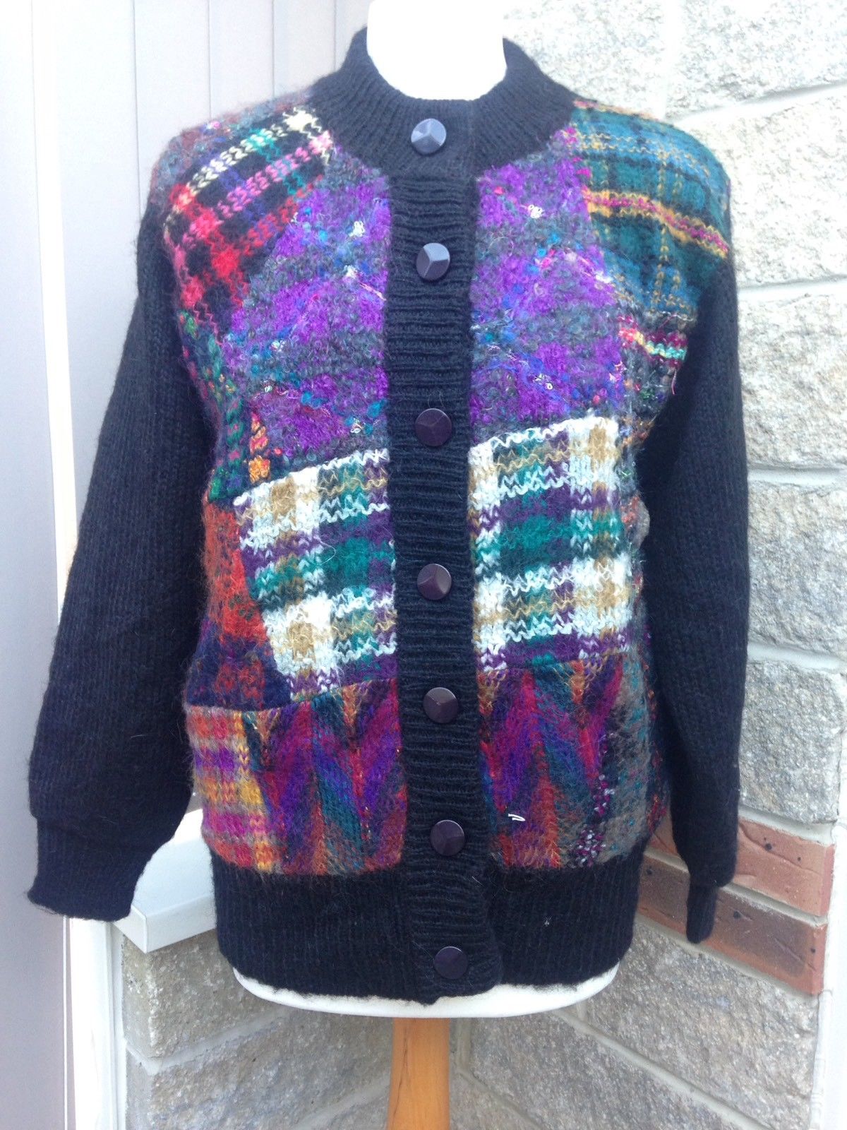 An image of a purple vintage cardigan